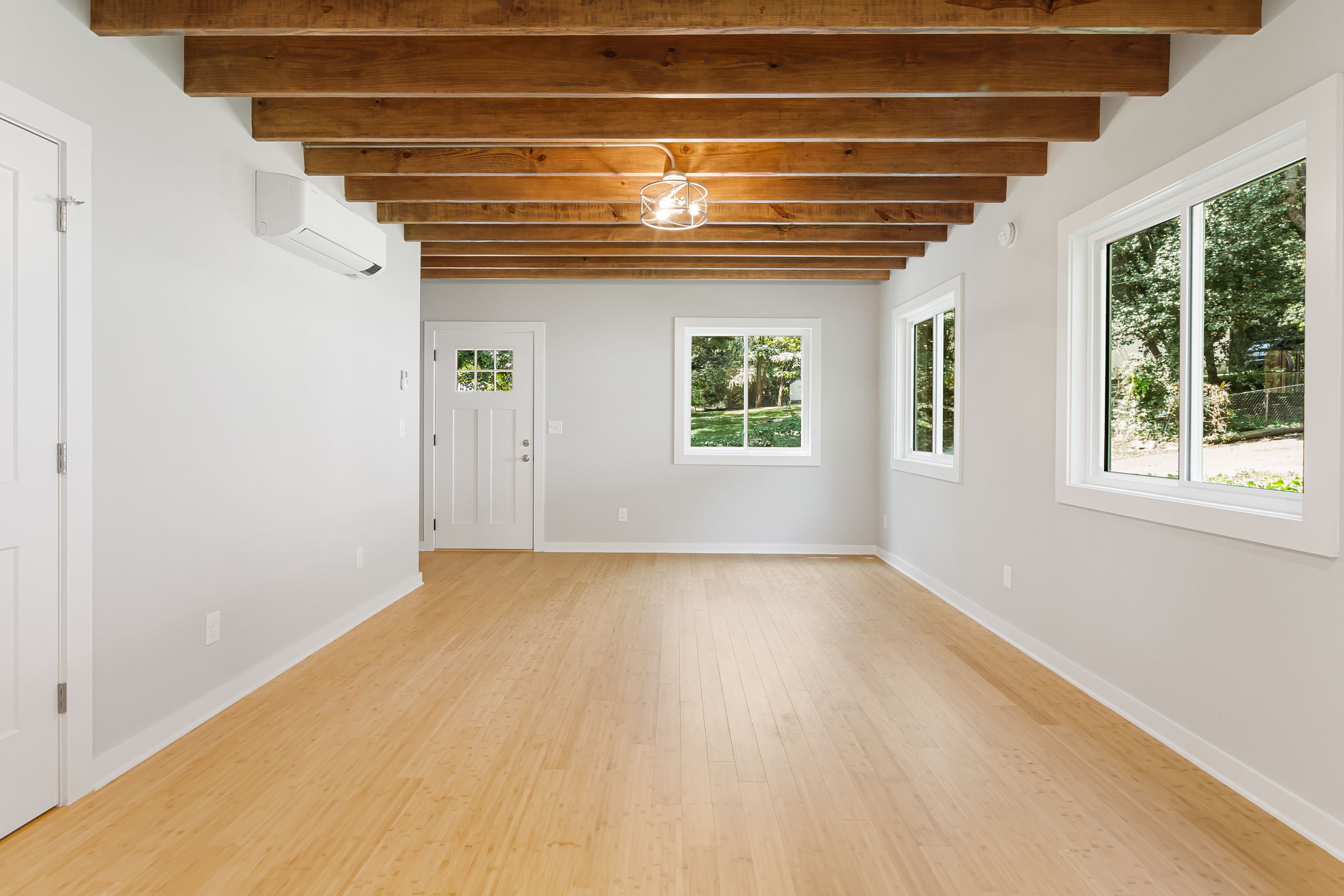 Budget Cottage 2 Bed — living room with exposed beam ceiling