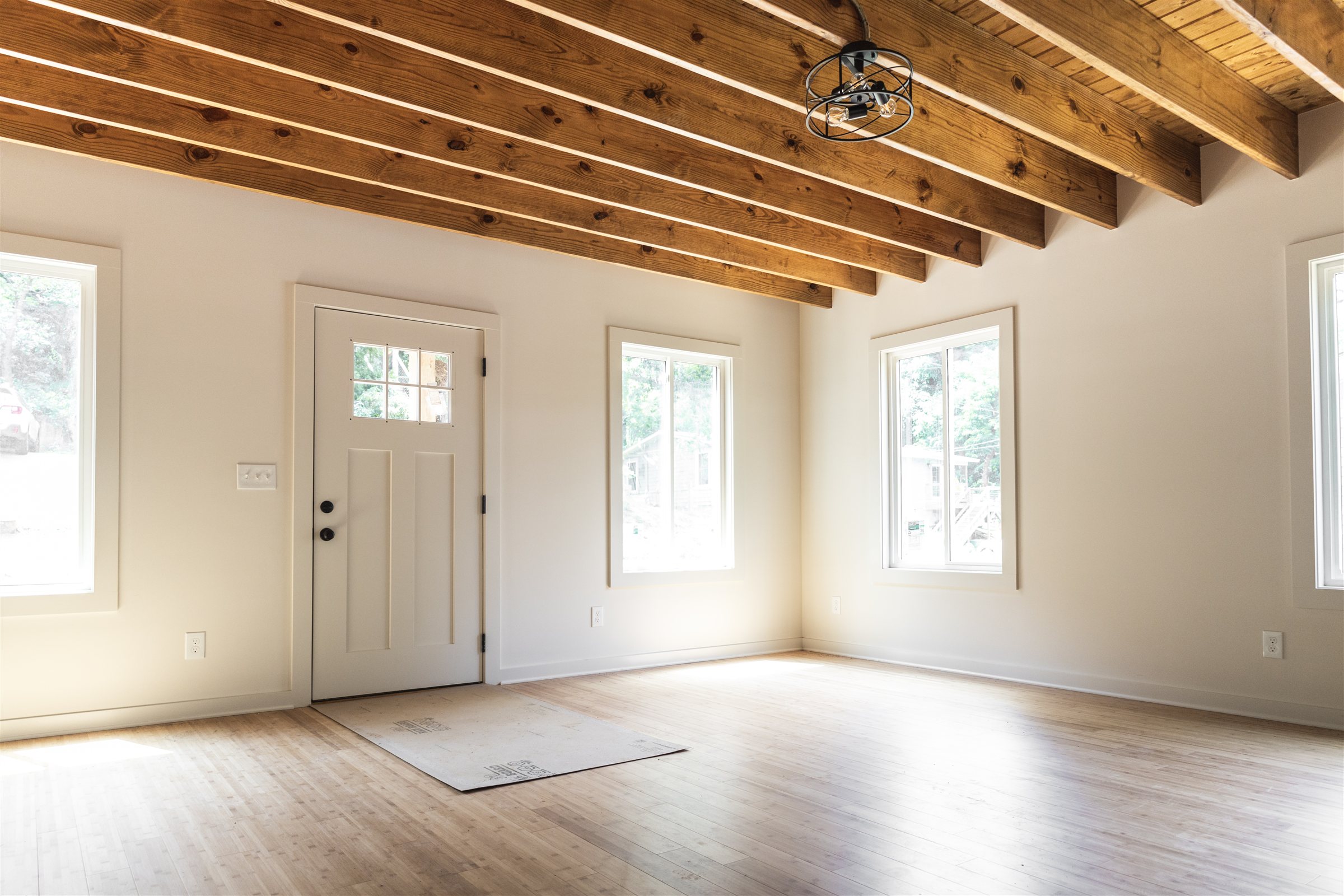 Standard Cottage 3 Bed — living room with exposed beam ceiling