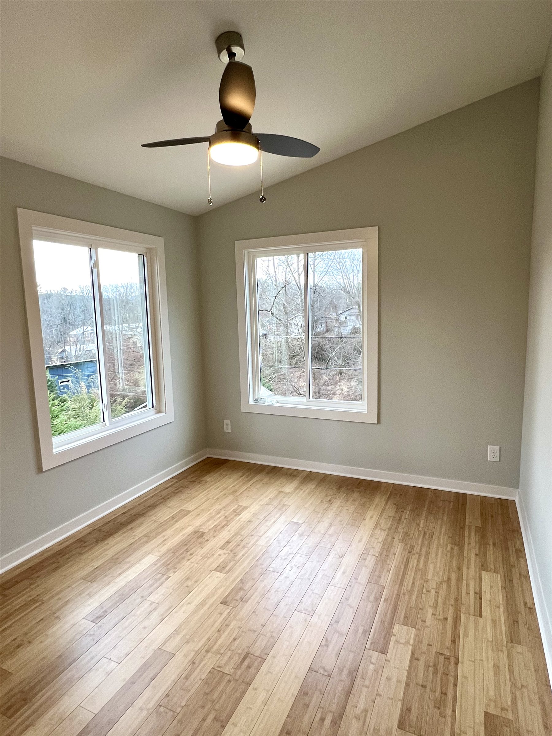 Standard Cottage XL 3 Bed — bedroom with two windows and mountain views